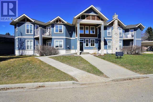 103 - 4808 52 Street, Condo with 2 bedrooms, 1 bathrooms and 1 parking in Lacombe AB | Image 1
