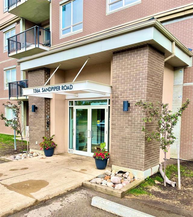 415 - 136a Sandpiper Road, Condo with 2 bedrooms, 2 bathrooms and 2 parking in Wood Buffalo AB | Image 2