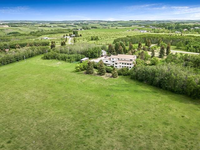 8016 266 Avenue W, House detached with 6 bedrooms, 7 bathrooms and 12 parking in Foothills County AB | Image 48