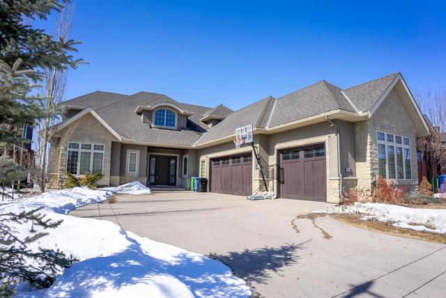 211 Aspen Ridge Place Sw, House detached with 4 bedrooms, 4 bathrooms and 3 parking in Calgary AB | Image 1