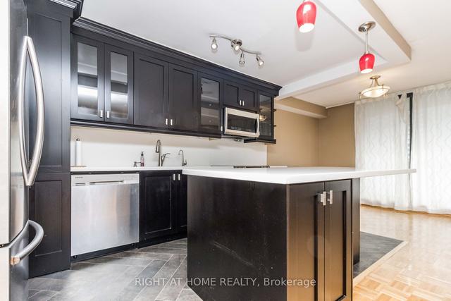 1411 - 177 Linus Rd, Condo with 2 bedrooms, 2 bathrooms and 1 parking in Toronto ON | Image 3