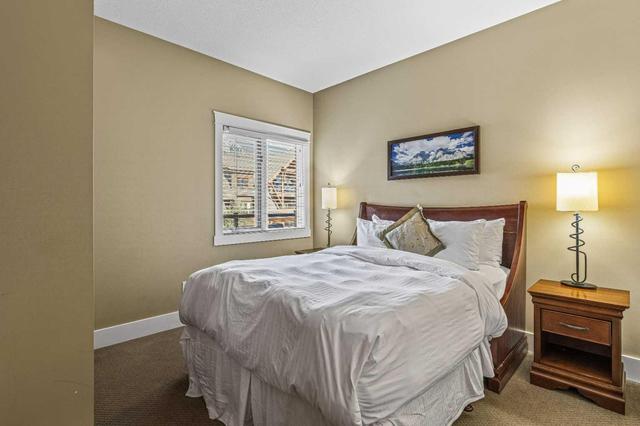 407 - 187 Kananaskis Way, Condo with 3 bedrooms, 2 bathrooms and 1 parking in Canmore AB | Image 26