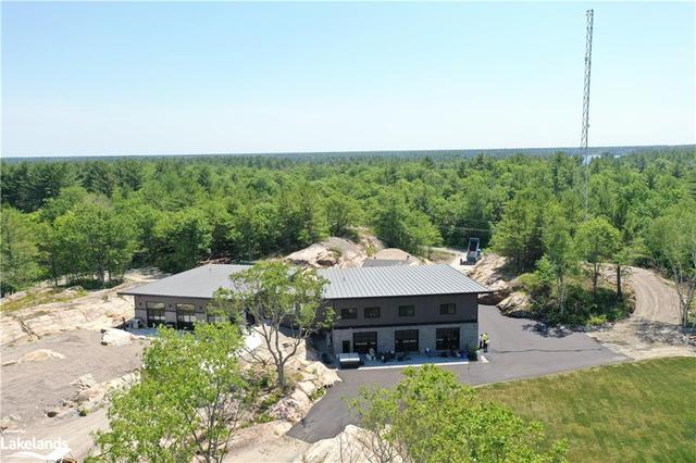 1115 North Kahshe Lake Road, House detached with 9 bedrooms, 4 bathrooms and null parking in Gravenhurst ON | Image 33