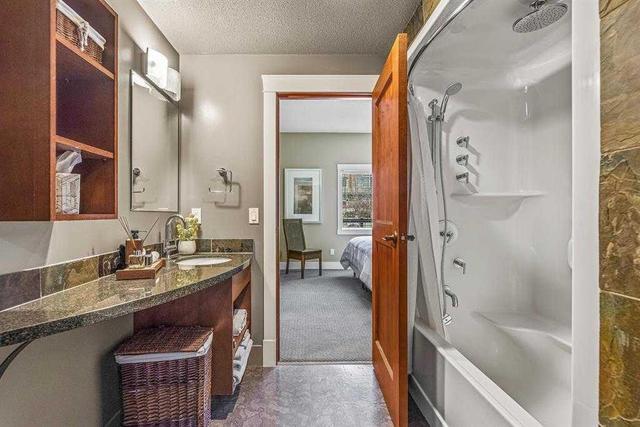 124 - 173 Kananaskis Way, Condo with 2 bedrooms, 2 bathrooms and 1 parking in Canmore AB | Image 13