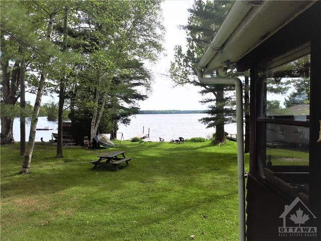 502 Delong Road, House detached with 2 bedrooms, 1 bathrooms and 2 parking in Rideau Lakes ON | Image 3