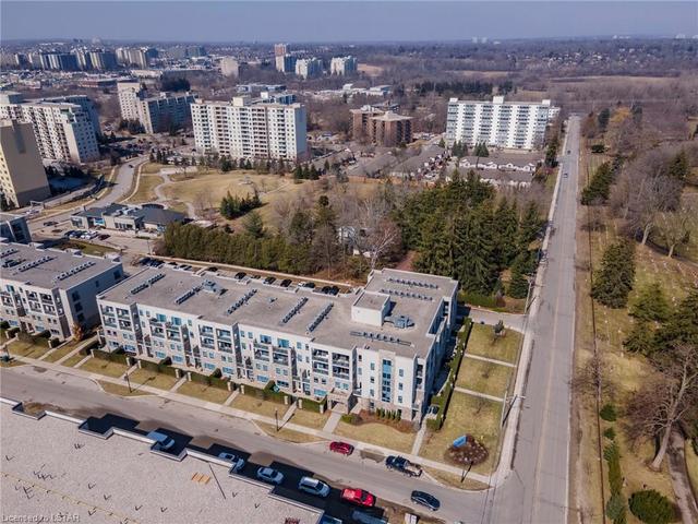 103 - 320 Sugarcreek Trail, House attached with 1 bedrooms, 1 bathrooms and 1 parking in London ON | Image 2