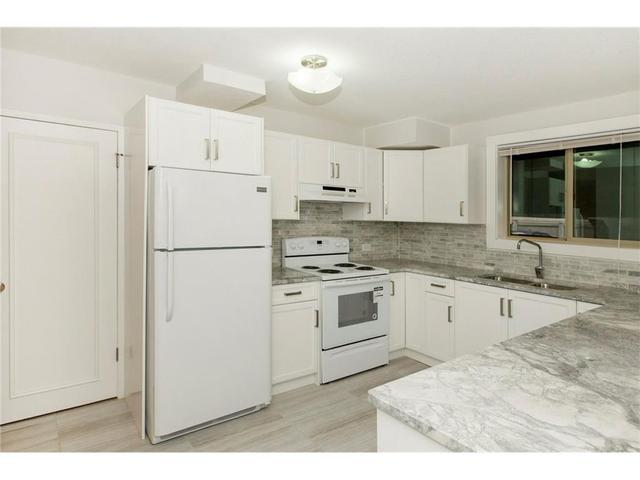 101 - 808 Royal Avenue Sw, Condo with 3 bedrooms, 2 bathrooms and 1 parking in Calgary AB | Image 2