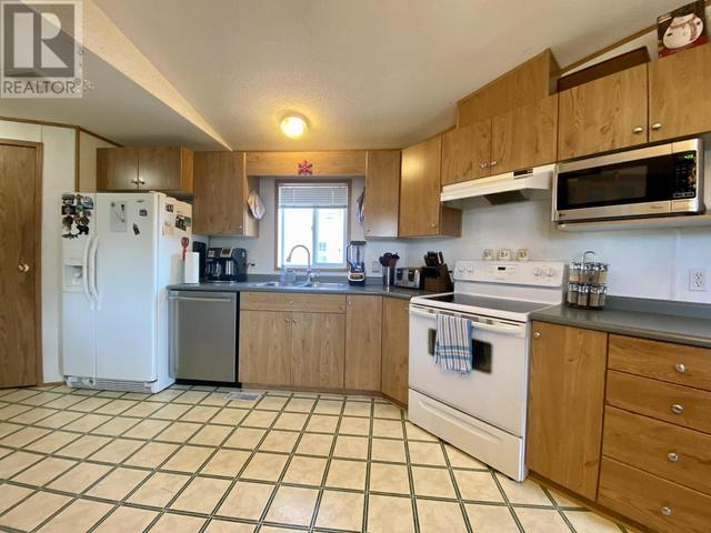 10601 101 Street, House other with 3 bedrooms, 2 bathrooms and null parking in Taylor BC | Image 19
