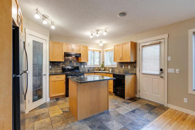 8924 Wentworth Avenue Sw, House detached with 4 bedrooms, 2 bathrooms and 2 parking in Calgary AB | Image 14