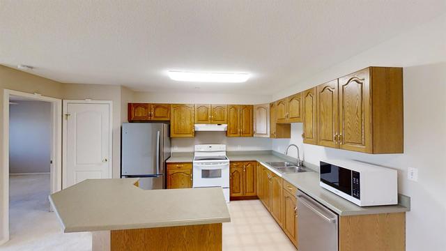 207 - 9111 104 Avenue, Condo with 2 bedrooms, 2 bathrooms and 1 parking in Grande Prairie AB | Image 9
