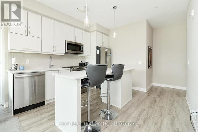 322 - 128 Grovewood Common, Condo with 2 bedrooms, 2 bathrooms and 2 parking in Oakville ON | Image 9