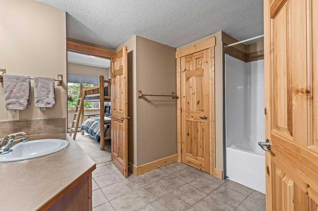 215 - 175 Crossbow Place, Condo with 2 bedrooms, 2 bathrooms and 1 parking in Canmore AB | Image 16