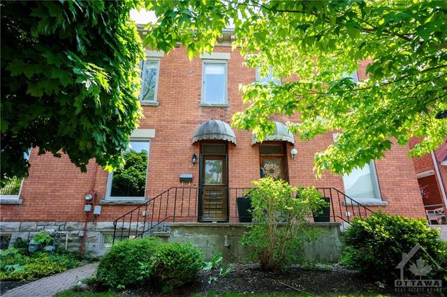 68 Fourth Avenue, Townhouse with 3 bedrooms, 2 bathrooms and 2 parking in Ottawa ON | Image 1
