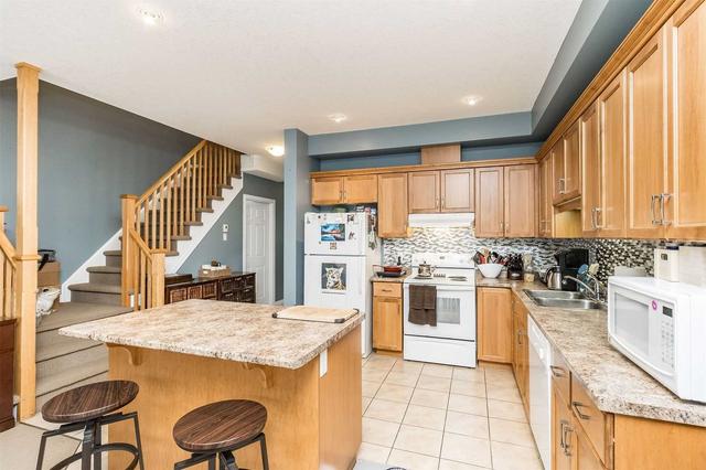 14 Clough Cres, House attached with 3 bedrooms, 4 bathrooms and 3 parking in Guelph ON | Image 2