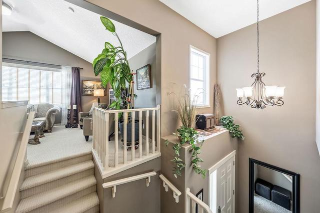 7903 Cougar Ridge Avenue Sw, House detached with 4 bedrooms, 3 bathrooms and 2 parking in Calgary AB | Image 14
