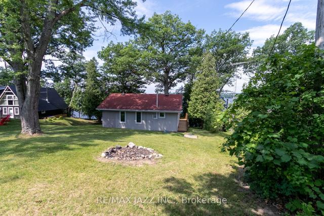 52 Cow Island, House detached with 2 bedrooms, 1 bathrooms and 0 parking in Otonabee South Monaghan ON | Image 19