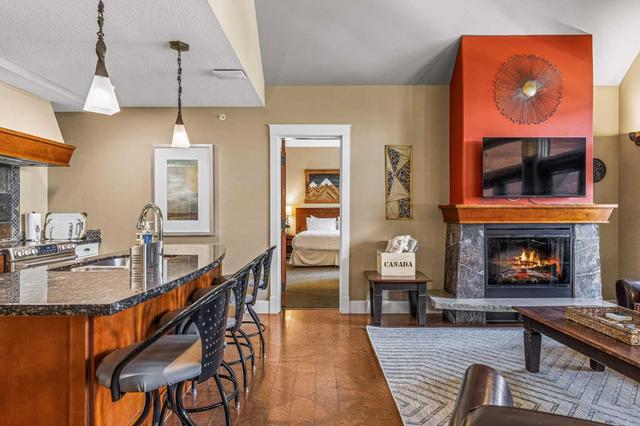 412 - 173 Kananaskis Way, Condo with 2 bedrooms, 2 bathrooms and 1 parking in Canmore AB | Image 4