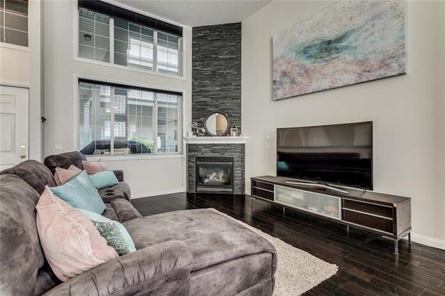 102 - 527 15 Avenue Sw, Condo with 2 bedrooms, 2 bathrooms and 1 parking in Calgary AB | Image 2