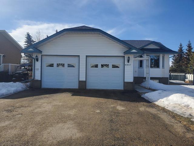 10107 106 Street, House detached with 3 bedrooms, 2 bathrooms and 4 parking in Hythe AB | Image 1