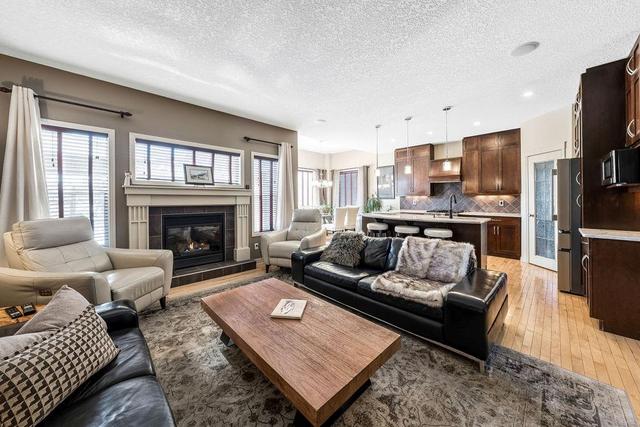 7903 Cougar Ridge Avenue Sw, House detached with 4 bedrooms, 3 bathrooms and 2 parking in Calgary AB | Image 6