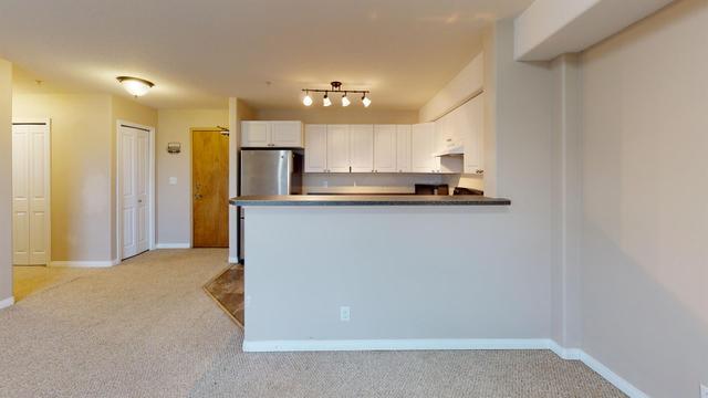 215 - 248a Grosbeak Way, Condo with 2 bedrooms, 1 bathrooms and 1 parking in Wood Buffalo AB | Image 8