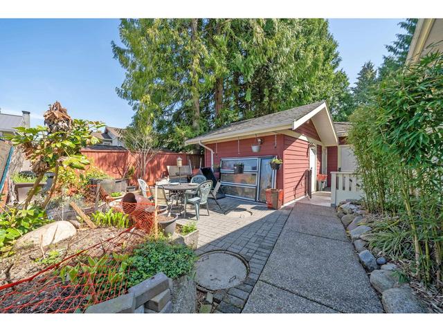 1033 Como Lake Avenue, House detached with 7 bedrooms, 8 bathrooms and 8 parking in Coquitlam BC | Image 39