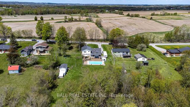 1669 Baseline Rd, House detached with 3 bedrooms, 2 bathrooms and 8 parking in Otonabee South Monaghan ON | Image 29