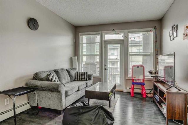 210 - 48 Panatella Road Nw, Condo with 2 bedrooms, 2 bathrooms and 1 parking in Calgary AB | Image 2