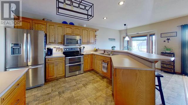 9731 97 Street, House detached with 5 bedrooms, 3 bathrooms and null parking in Taylor BC | Image 13