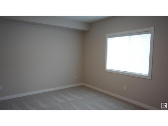 206 - 560 Griesbach Pr Nw, Condo with 2 bedrooms, 2 bathrooms and 1 parking in Edmonton AB | Image 5