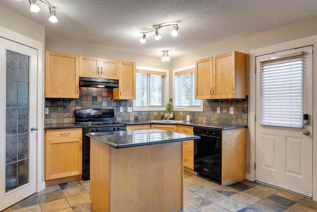8924 Wentworth Avenue Sw, House detached with 4 bedrooms, 2 bathrooms and 2 parking in Calgary AB | Image 15