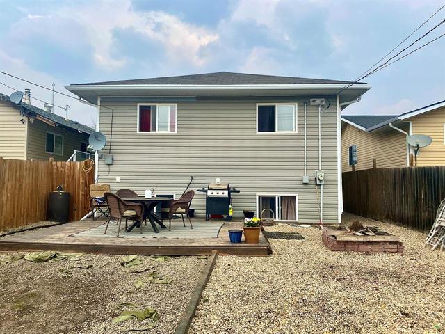 9811 99 Avenue, House detached with 5 bedrooms, 2 bathrooms and 2 parking in Sexsmith AB | Image 16