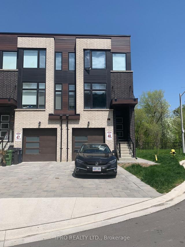 2 - 8 Creekbank Rd, House semidetached with 2 bedrooms, 2 bathrooms and 1 parking in Toronto ON | Image 1