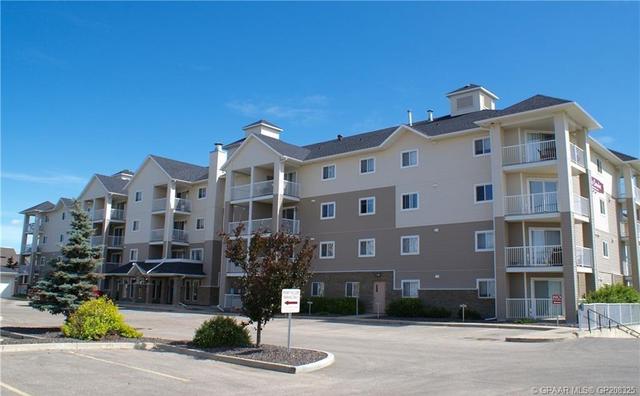 205 - 11240 104 Avenue, Condo with 1 bedrooms, 1 bathrooms and 1 parking in Grande Prairie AB | Image 1