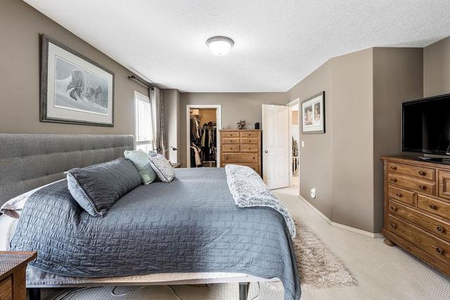 7903 Cougar Ridge Avenue Sw, House detached with 4 bedrooms, 3 bathrooms and 2 parking in Calgary AB | Image 16