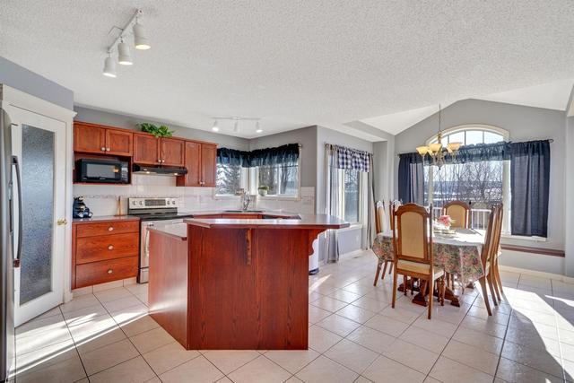 217 Hidden Creek Boulevard Nw, House detached with 3 bedrooms, 3 bathrooms and 4 parking in Calgary AB | Image 13