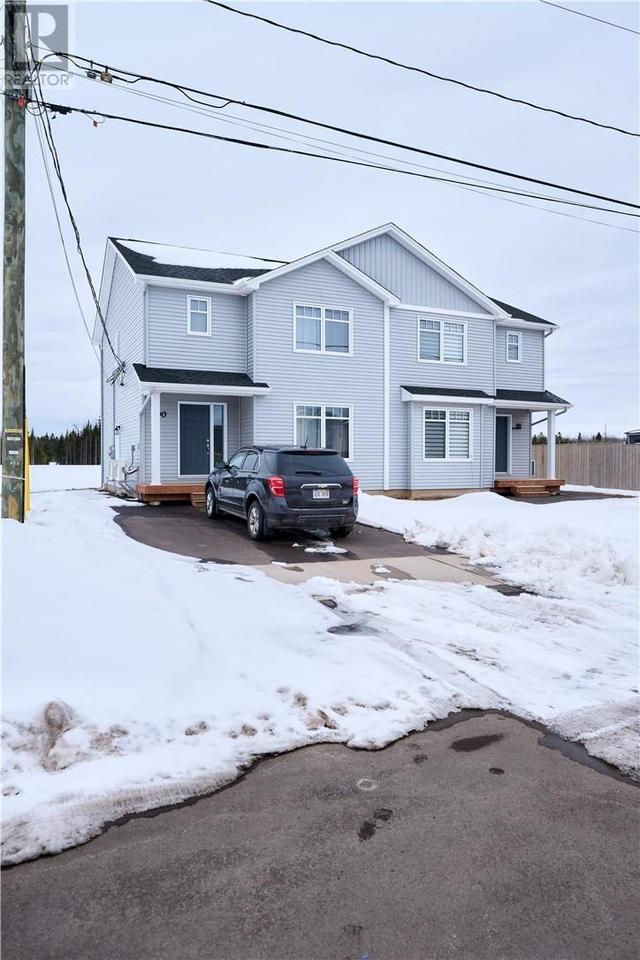 90 Newcombe Dr, House semidetached with 4 bedrooms, 3 bathrooms and null parking in Moncton NB | Image 1