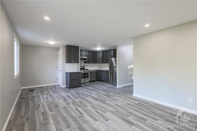 a - 64 Binscarth Crescent, Condo with 2 bedrooms, 1 bathrooms and 2 parking in Ottawa ON | Image 2