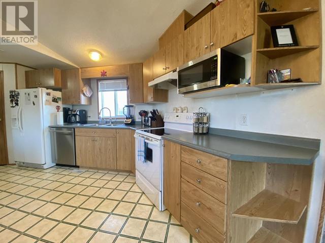 10601 101 Street, House other with 3 bedrooms, 2 bathrooms and null parking in Taylor BC | Image 17