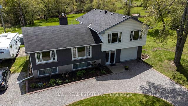 1669 Baseline Rd, House detached with 3 bedrooms, 2 bathrooms and 8 parking in Otonabee South Monaghan ON | Image 12