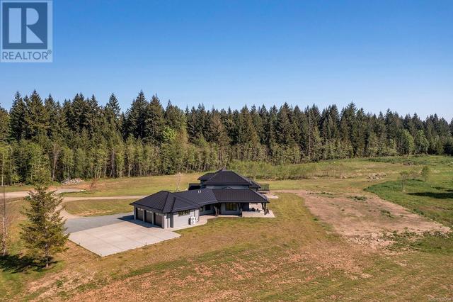 2355 Coleman Rd, House detached with 5 bedrooms, 4 bathrooms and 12 parking in Comox Valley B (Lazo North) BC | Image 53