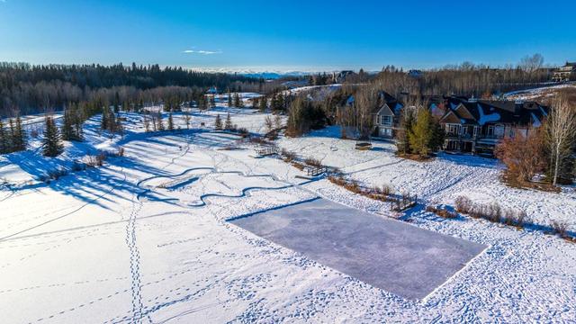 8 Reflection Cove, House detached with 7 bedrooms, 6 bathrooms and 6 parking in Rocky View County AB | Image 45