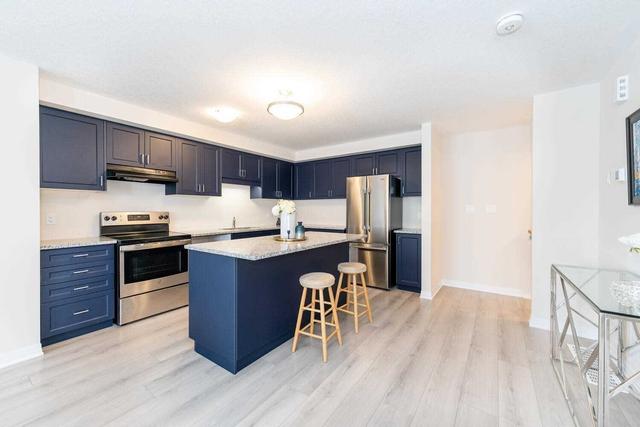102 Progress Cres, Townhouse with 2 bedrooms, 3 bathrooms and 2 parking in Kitchener ON | Image 9