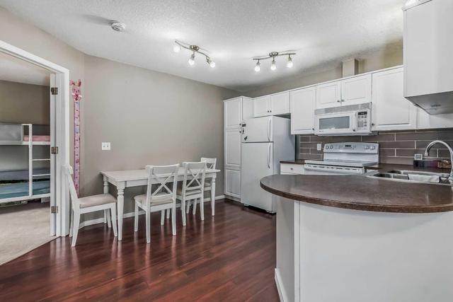 204 - 10 Sierra Morena Mews Sw, Condo with 2 bedrooms, 2 bathrooms and 2 parking in Calgary AB | Image 5