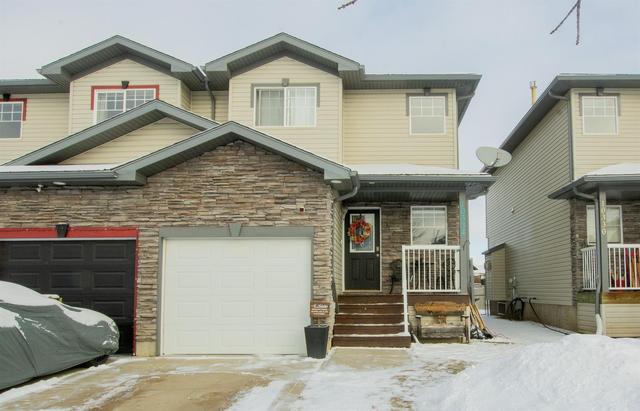 10334 70 Avenue, Home with 3 bedrooms, 1 bathrooms and 2 parking in Grande Prairie AB | Image 1