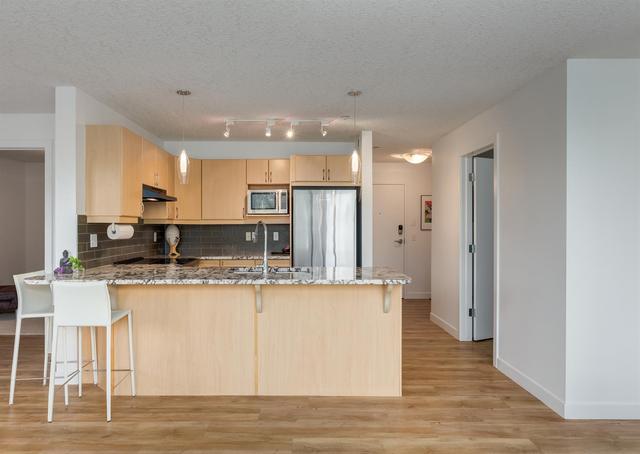 103 - 603 7 Avenue Ne, Condo with 2 bedrooms, 2 bathrooms and 1 parking in Calgary AB | Image 9