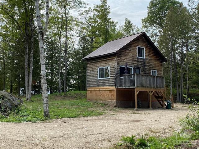 1032 Log Cabin Lane, House detached with 6 bedrooms, 5 bathrooms and 10 parking in North Frontenac ON | Image 10