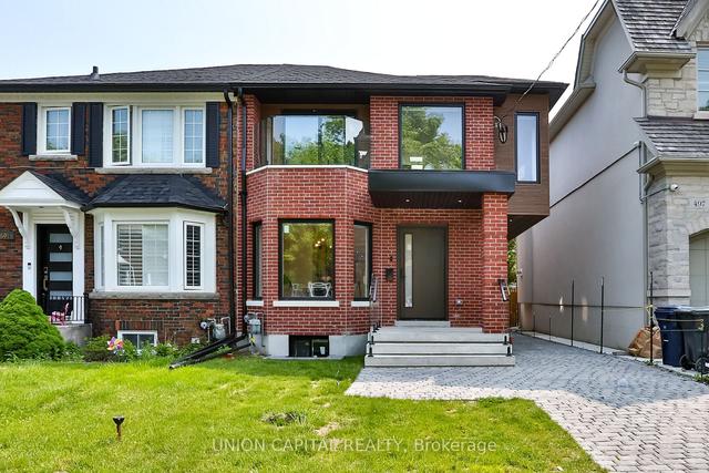 499 Sutherland Dr, House semidetached with 4 bedrooms, 5 bathrooms and 4 parking in Toronto ON | Image 1