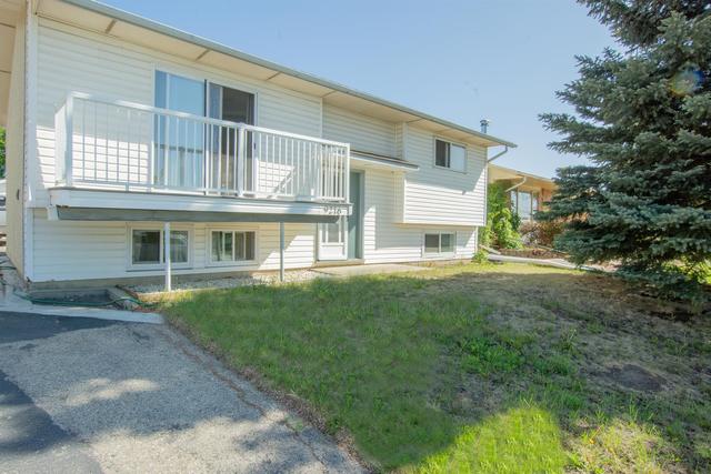 9216 108 Avenue, House detached with 3 bedrooms, 2 bathrooms and 4 parking in Grande Prairie AB | Image 2