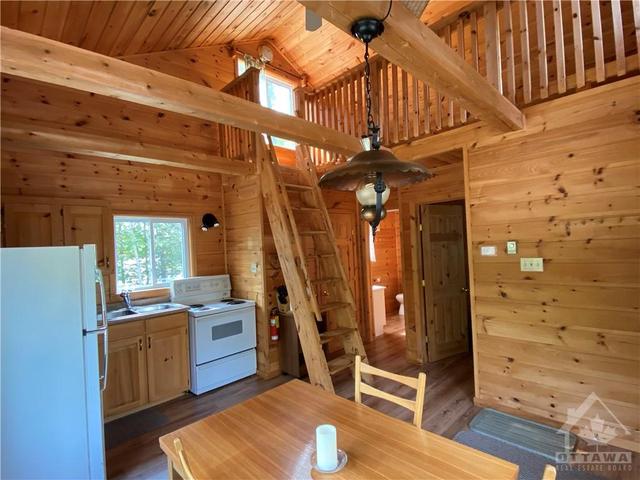 1032 Log Cabin Lane, House detached with 6 bedrooms, 5 bathrooms and 10 parking in North Frontenac ON | Image 13